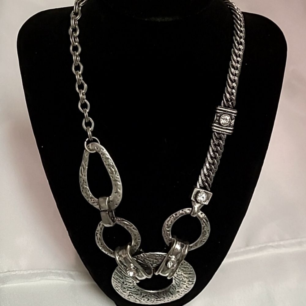 Statement silver tone,  multiple disks